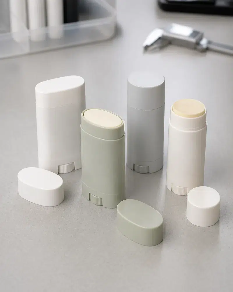 Oval and round sunscreen stick packaging cross-sections