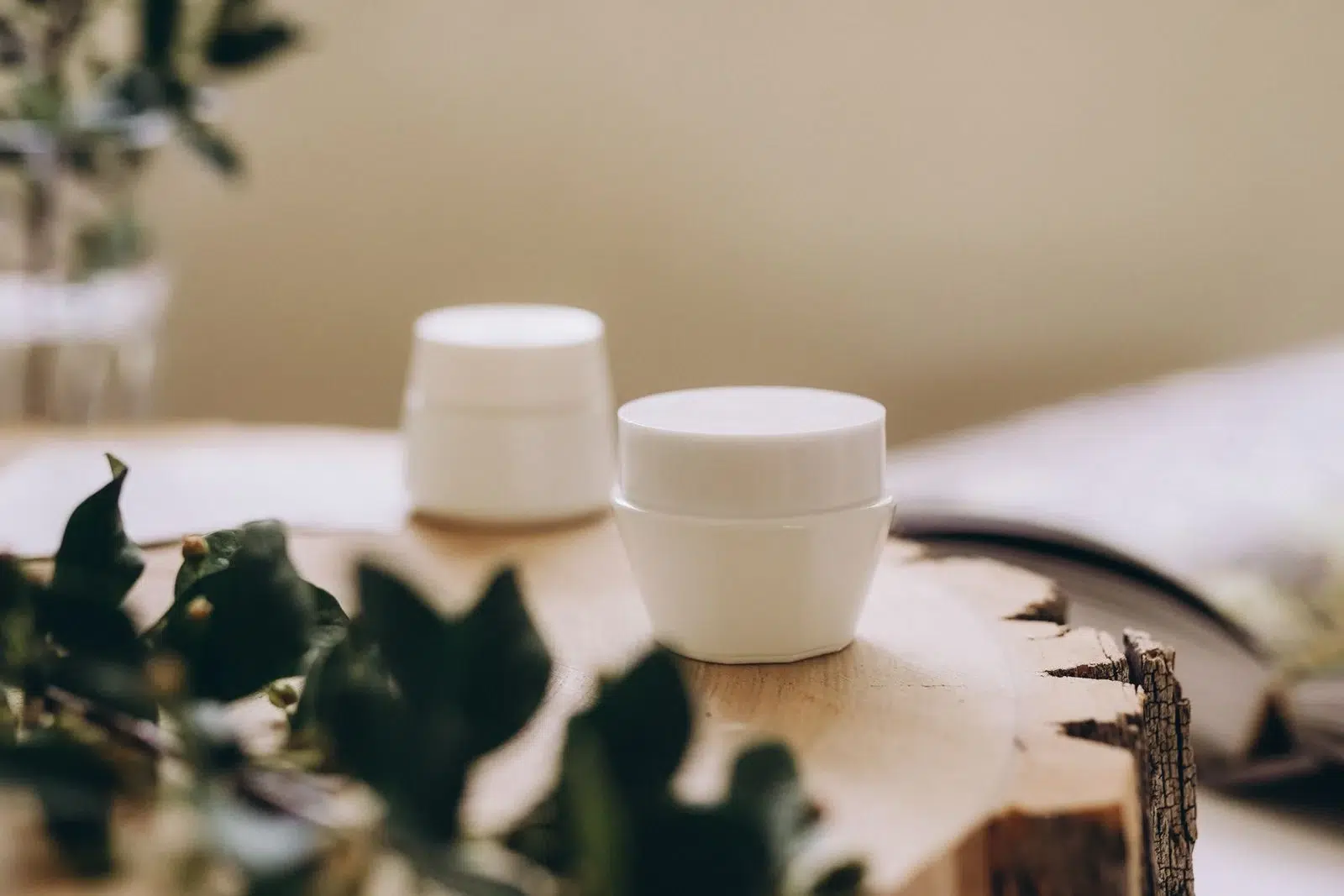 Blank cosmetic containers representing sunscreen minimum order quantities